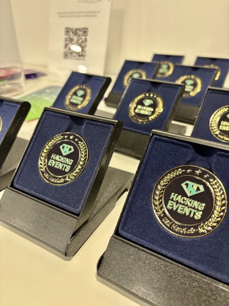Multiple awards labeled “Hacking Events” in blue cases, provided for participants of the usd Hackertage and usd Hacking Night.