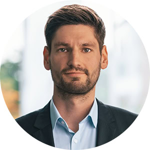 Portrait of Torsten Schlotmann, Head of PCI & Payment Security und Quality Management Officer at usd AG, in a suit.